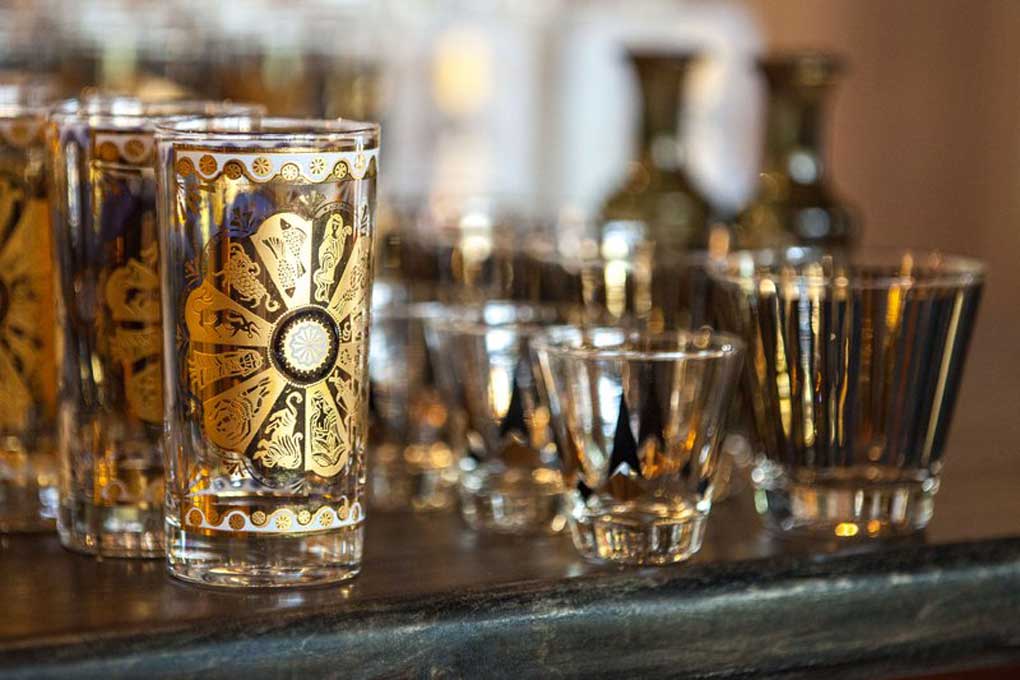 Close up of shot glasses and beer glasses